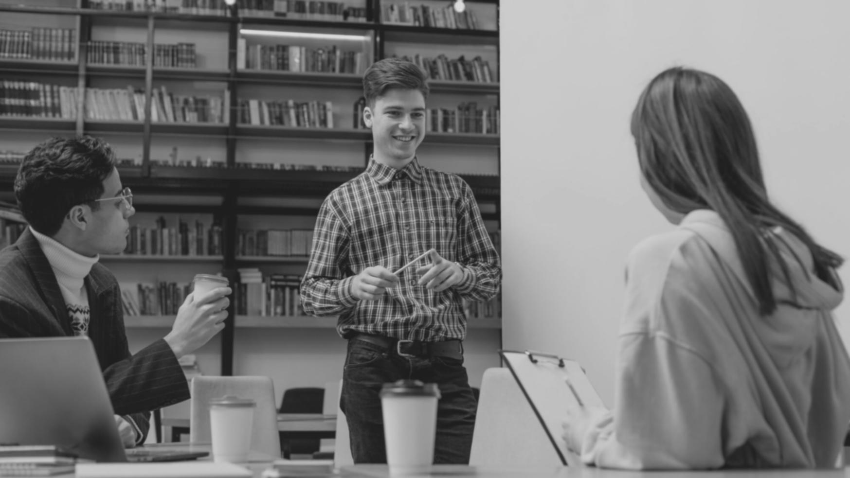 Financial planning session with business stakeholders reviewing analysis reports